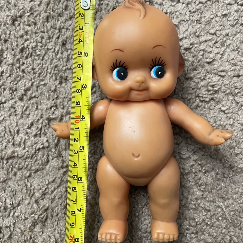 Tan vintage 8” kewpie baby doll, blue eyes, posable